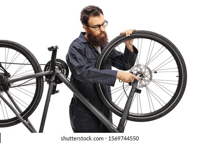 Professional Man Mending A Bicycle Isolated On White Background Isolated On White Background