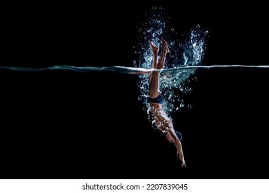 Professional man swimmer on a wave - Shutterstock ID 2207839045