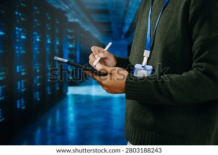 IT professional managing servers in data center, showcasing cloud computing, network infrastructure, cybersecurity, and modern digital technology operations.