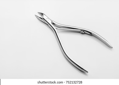 Professional Manicure Tools On A White Background. Cuticle Nipper
