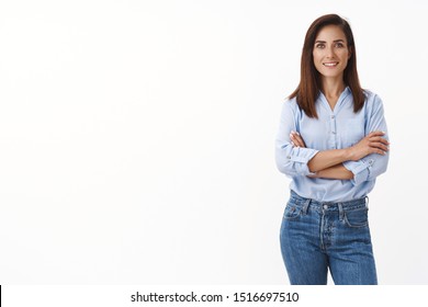 Professional mature confident female entrepreneur starting own company feel encouraged, smiling empowered pleased, cross arms self-assured pose, grinning, aim success, stand white background