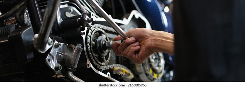 Professional Mechanic Repair Some Part Of Motorbike With Equipment