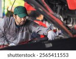 Professional mechanic working in repair shops and maintenance services, repairing a car engine automotive workshop, Car service and maintenance, Repair service.