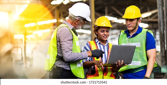 Professional Mechanical Engineer team Working on Personal Computer at Metal lathe industrial manufacturing factory. Engineer Operating  lathe Machinery. Product quality Inspection - Shutterstock ID 1721715541