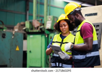 Professional Mechanical Engineer Team Working On Digital Tablet Computer At Industrial Manufacturing Factory. Engineer Operating Lathe Machinery. Product Quality Inspection