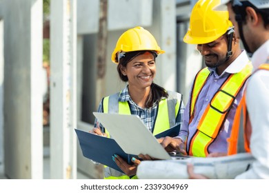 Professional Mechanical Engineer team Working on Personal laptop computer at Prefabricated concrete factory Heavy industrial. Product quality Inspection. Unity and teamwork concept