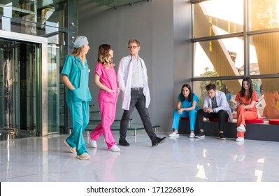 Professional medical professionals waiting in line in hospital - Powered by Shutterstock