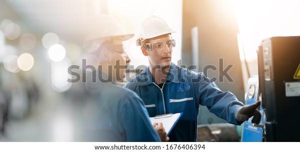 Professional men\
engineer worker skills quality, maintenance, training industry\
factory worker , warehouse Workshop for factory operators,\
mechanical engineering team production.\
