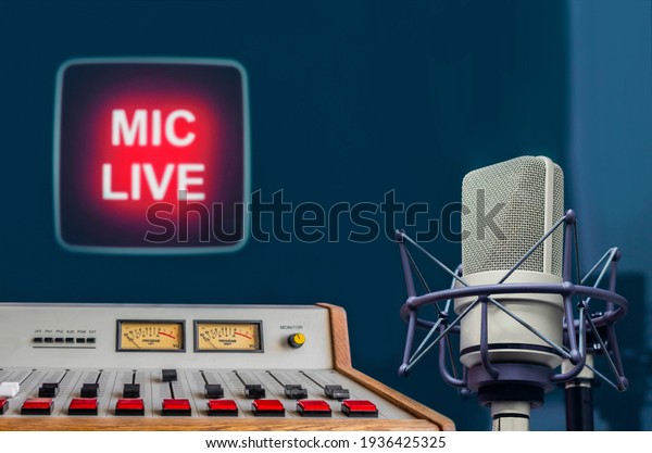 Professional microphone, audio console and on air\
sign in radio station\
studio
