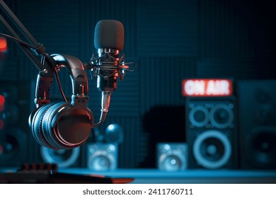 Professional microphone and headphones at the radio station, entertainment and communication concept