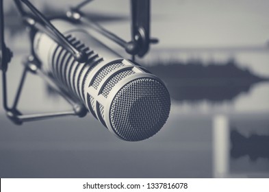 Professional microphone and sound wave form - Shutterstock ID 1337816078