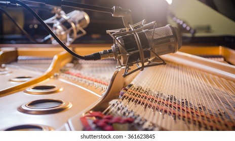 Professional Microphones Recording Above Grand Piano.