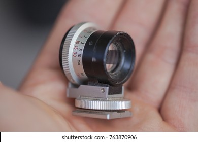 Professional Mini macro camera lens in the hand