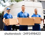 Professional Movers Loading a Van with Boxes for a House Move, Efficient Truck Driver Executing Relocation Services With Team.