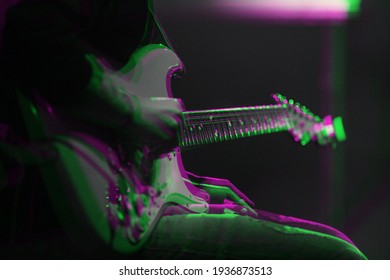 Professional Musician Playing Electric Guitar On Stage Edited With 3d Stereo Effect.Guitarist Play Live Set On Rock Concert In Music Hall.Download Royalty Free Curated Images Collection With Musicians