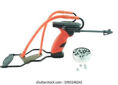 Professional Orange Slingshot With  Metal Bullets Isolate On White Background. Modern Slingshot With Ergonomic Grip With Tubular Bands.
