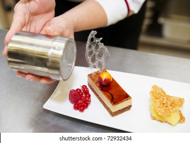 Professional Pastry Chef Is Decorating A Dessert