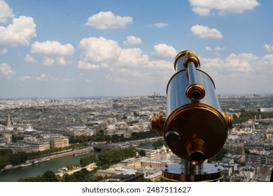 Professional photo of the observation deck and telescope at the Eiffel Tower in Paris, France, overlooking the city and river. - Powered by Shutterstock