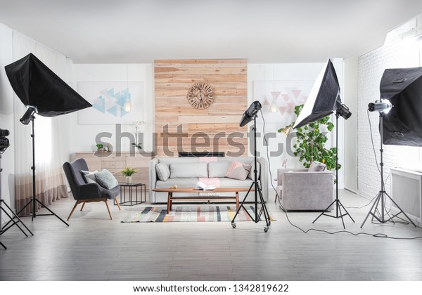 Professional photo studio equipment prepared for\
shooting living room\
interior