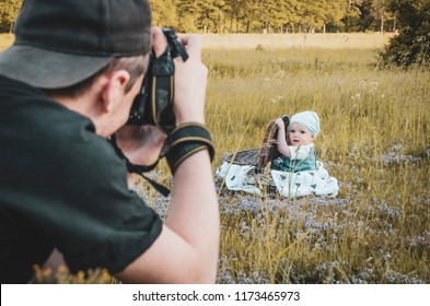 A Professional Photographer Organizes A Photo Shoot For Children