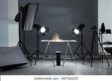 Professional photography equipment prepared for shooting stylish shoes in studio - Shutterstock ID 1457165255