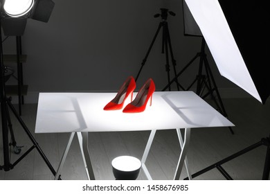 Professional photography equipment prepared for shooting stylish shoes in studio - Shutterstock ID 1458676985