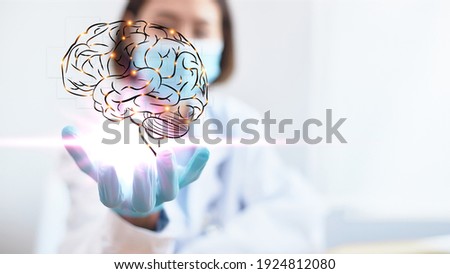 The professional physician opens his hand and has a brain icon with sparkling light. Medical concept of neurology. Modern diagnosis innovation and treatment of diseases.