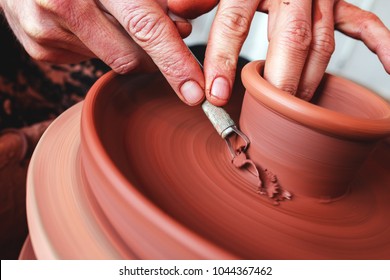 Professional potter making bowl in pottery workshop, studio. - Powered by Shutterstock