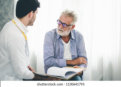 Professional Psychologist Doctor Discussing With Patient In Therapy Sessions At Hospital Room, Medical And Behavioral Health Concept