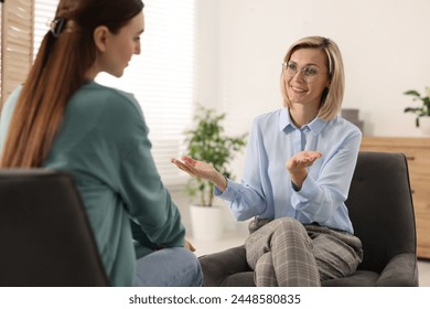 Professional psychotherapist working with patient in office - Powered by Shutterstock