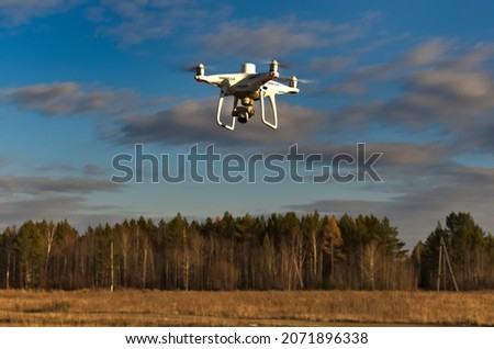 Professional quadcopter with high resolution camera onboard and real time kinematic GPS