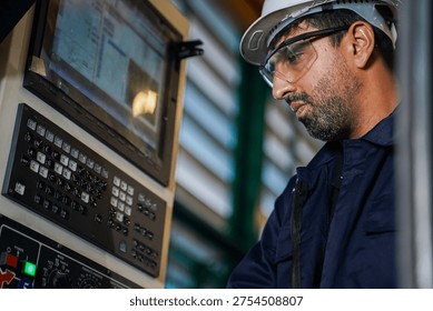 Professional quality control engineer inspecting precision automotive metal parts in a manufacturing factory.