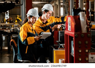 Professional quality control inspector conduct safety inspection on steel machinery and manufacturing process. Factory engineer or operator make optimization in heavy industry facility. Exemplifying - Powered by Shutterstock