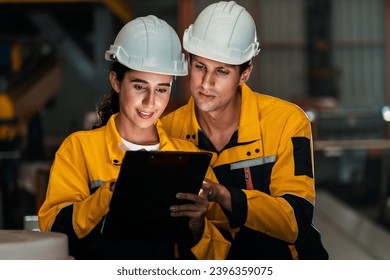 Professional quality control inspector conduct safety inspection on steel machinery and manufacturing process. Factory engineer or operator make optimization in heavy industry facility. Exemplifying - Shutterstock ID 2396359075