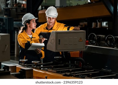 Professional quality control inspector conduct safety inspection on steel machinery and manufacturing process. Factory engineer or operator make optimization in heavy industry facility. Exemplifying - Shutterstock ID 2396359123