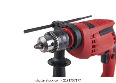 Professional Red Electric Drill Isolated On A White Background Close-up