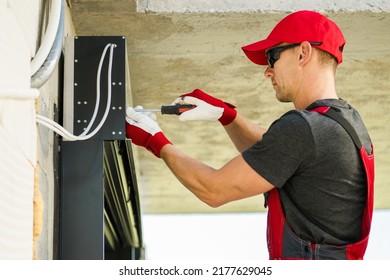 Professional Residential Window Shutters Instalator Finishing Window Cover Assembly. Automatic Shutter System.