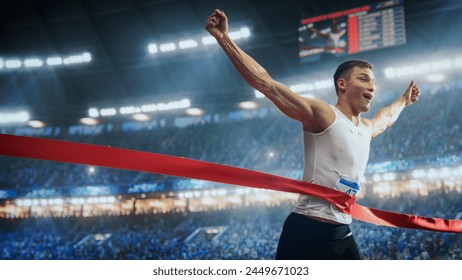 Professional Runner Competing In National Championship. A strong Caucasian Male Athlete is Sprinting Towards the Line in a Crowded Stadium, Crossing the Race Finish with His Hands in the Air - Powered by Shutterstock