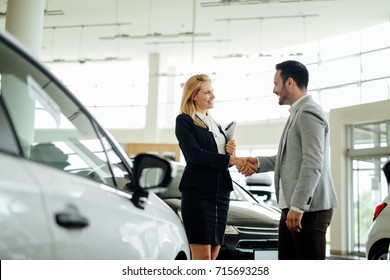 Professional Salesperson Selling Cars