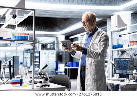 Professional scientist analyzing samples in modern laboratory setting, medical discovery process involves biotechnology research and molecular science. Healthcare data innovation.