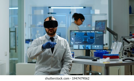 Professional Scientist Using Medical Inovation In Lab Wearing Virtual Reality Glasses, Gesticulating. Team Of Researchers Working With Equipment Device, Future, Medicine, Healthcare, Vision, Simulator