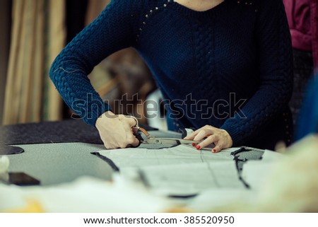 Professional seamstress at work.