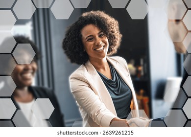 Professional setting with diverse individuals. Smiling woman in focus, business attire, diverse team, handshake. Positive business environment, diverse professionals. Business and technology.
