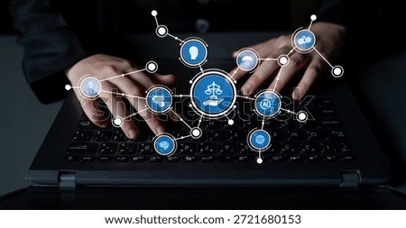 A professional setting showcases hands typing on a laptop with various legal icons around it, symbolizing the intersection of technology and law in a modern digital context. Tessel