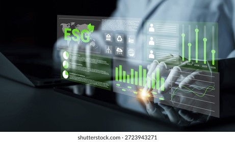 A professional setting showcasing advanced technology and data analysis focused on environmental sustainability metrics, emphasizing the importance of ESG principles in business strategy. Gantry