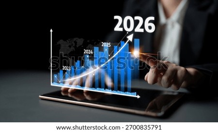 A professional setting showcasing data analysis and growth projections for business strategies in 2023 to 2026, emphasizing technology and financial investment trends. Tessel