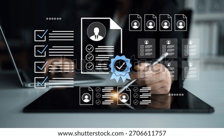A professional setting showcasing a digital workspace with recruitment documents and candidate profiles, emphasizing the job evaluation process and modern technology use. Gantry