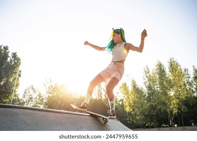 professional skateboarders having fun at the skate park - Powered by Shutterstock