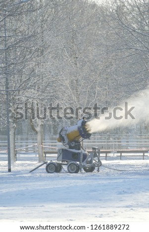 Professional snow making machine close up. Snowgun / snow cannon in winter ski park.