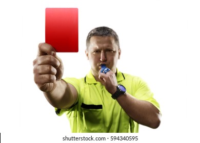 Professional soccer referee giving the red card isolated
